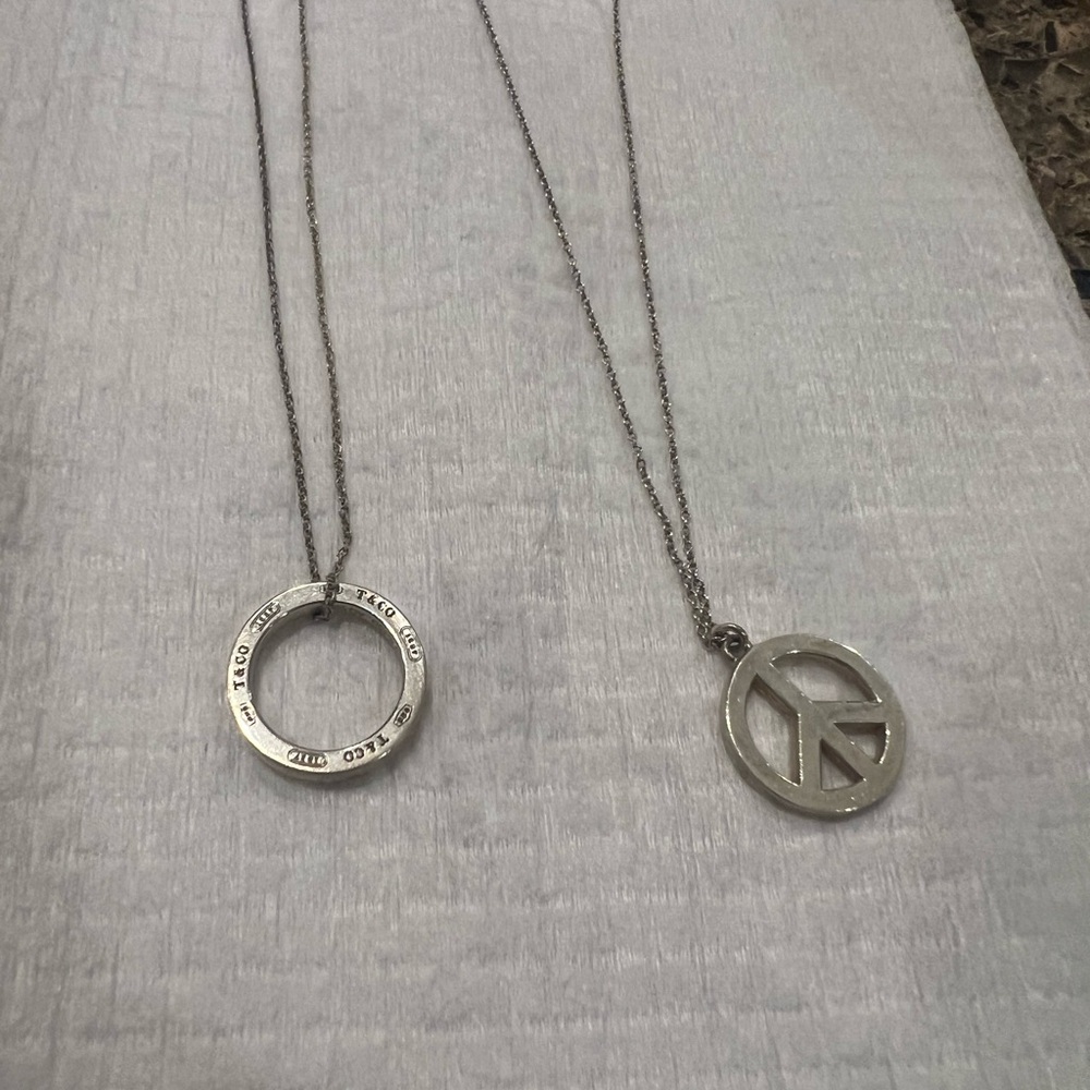 Silver Tiffany and co infinity Pendant Necklace ONLY.